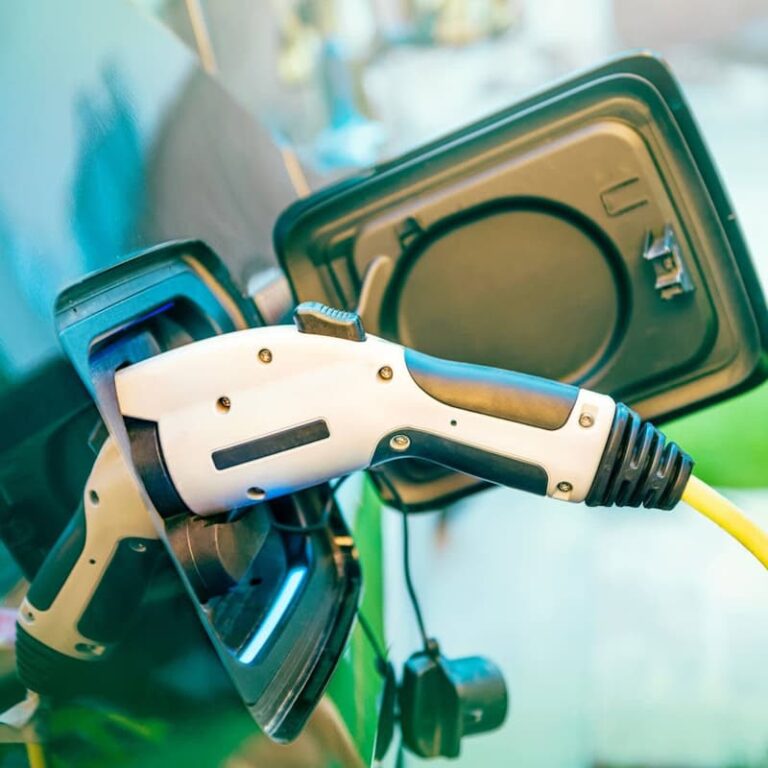 EV charger plugged in to a car